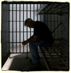 http://s3.picofile.com/file/7471836769/man_in_prison8.jpg