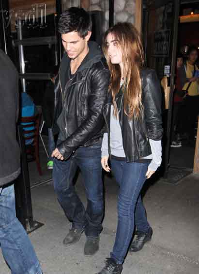 http://s3.picofile.com/file/7730301498/Taylor_Lautner_Lily_Collins_4.jpg