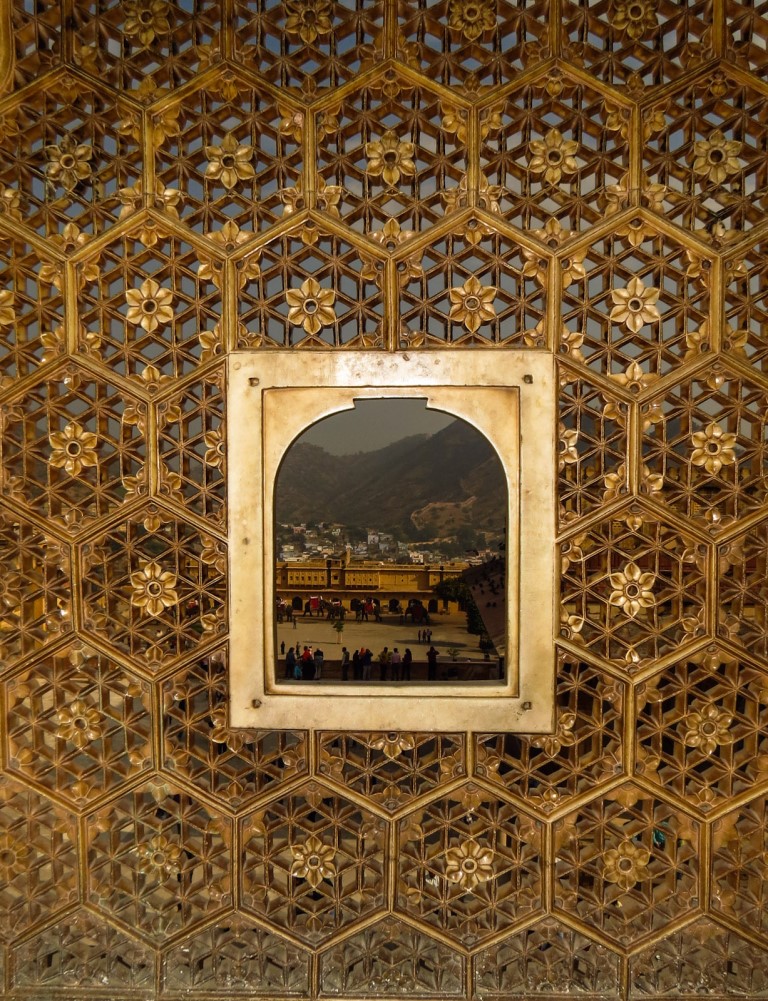 http://s3.picofile.com/file/8199616492/view_through_window_in_mosaic_amber_fort_jaipur.jpg