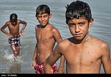 تصاویر بسیار بسیار جالب از  آبتنی کودکان در گاومیش آباد – اهواز ایران